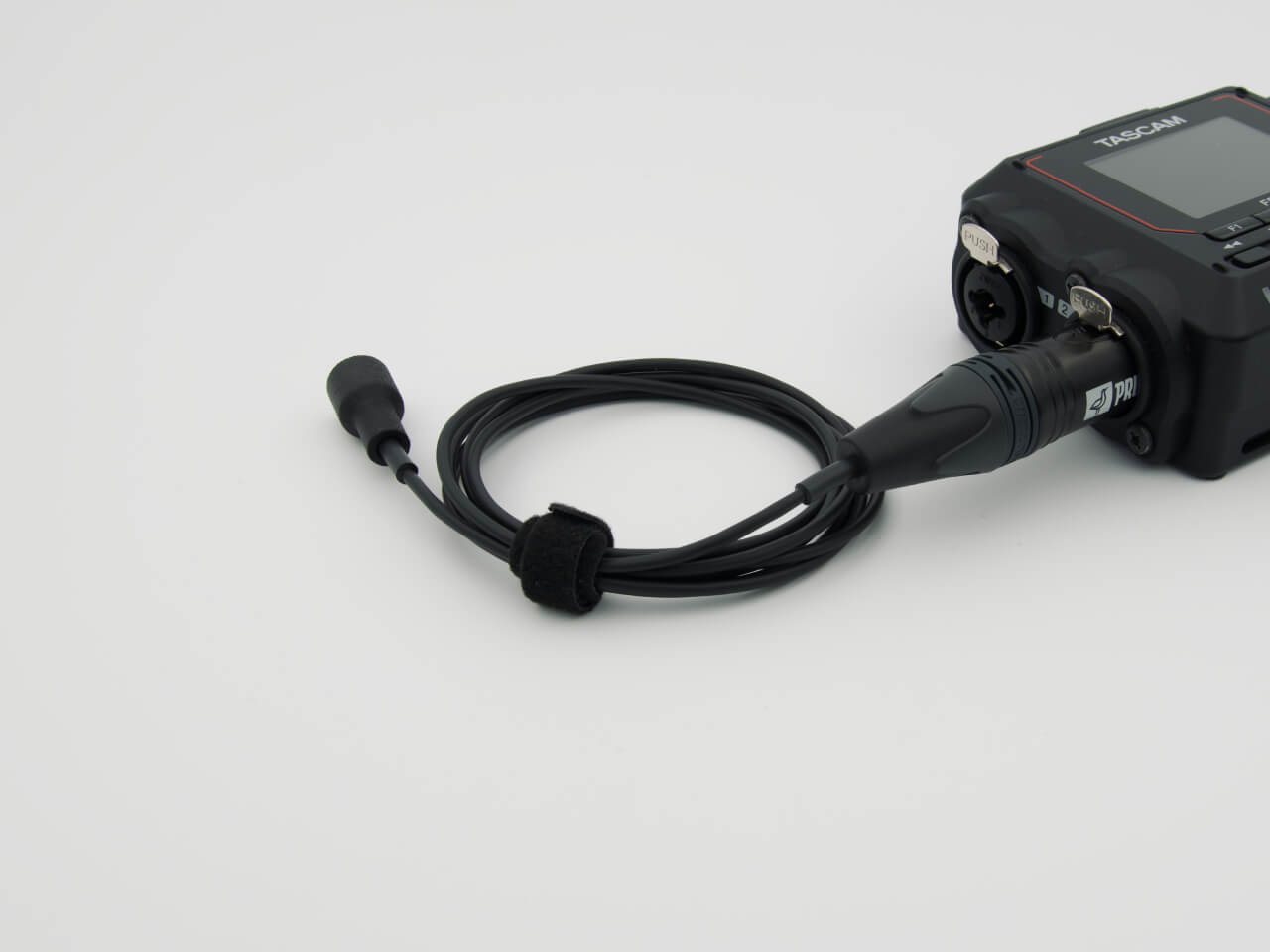 Prutka omnidirectional mono XLR microphone - plugged into a recorder